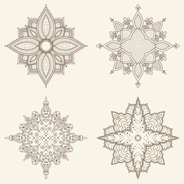 Set of four mandalas. Beautiful hand drawn flowers. - Vector, Imagen