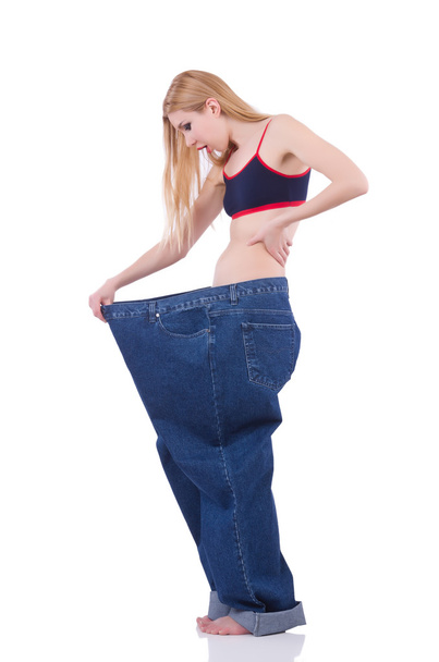 Dieetconcept met oversized jeans - Foto, afbeelding