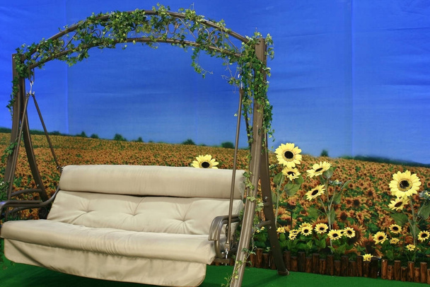 Very Relaxing Scene with swing and sunflowers - Photo, Image