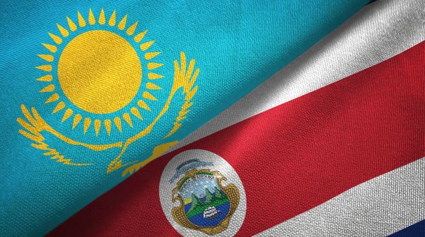 Kazahsztán és Costa Rica két zászló textil ruhával, szövet textúra - Fotó, kép