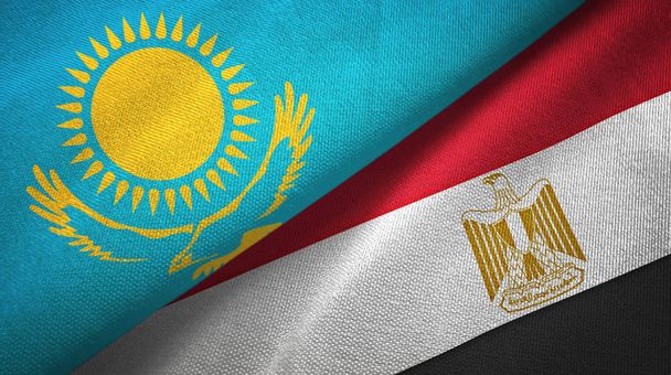 Kazachstan en Egypte twee vlaggen textiel doek - Foto, afbeelding