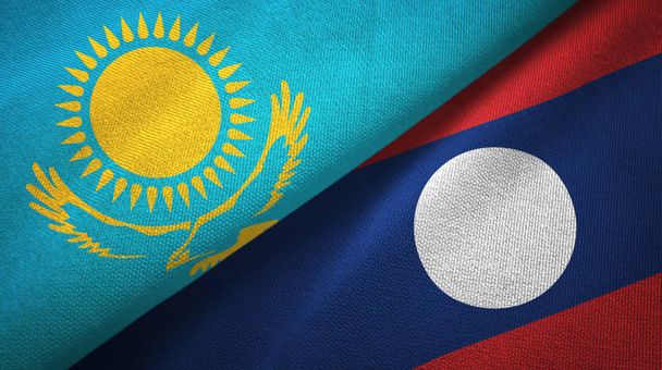 Kazakhstan and Laos two flags textile cloth. - Photo, Image