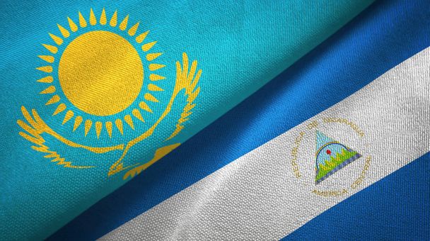 カザフスタンとニカラグアの2つの旗織物布、生地の質感 - 写真・画像