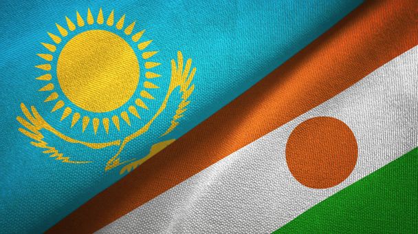 Kazakistan ve Nijer iki bayrak tekstil kumaş, kumaş doku - Fotoğraf, Görsel