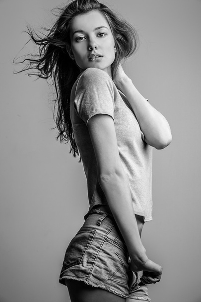 Young sensual model girl pose in studio. - Fotoğraf, Görsel