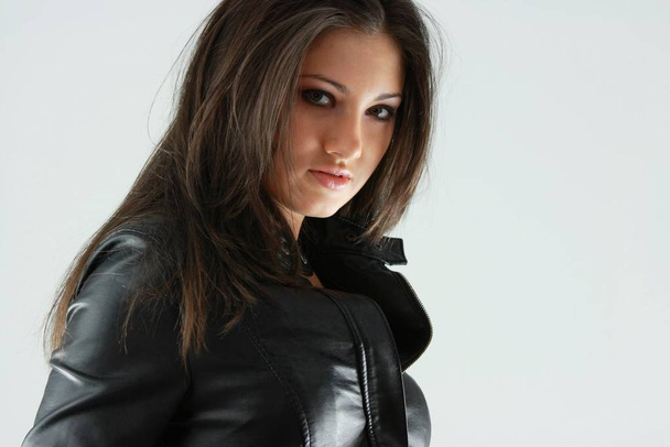 Beautiful young woman in black - Fotografie, Obrázek