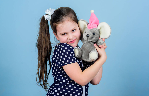 Her favorite toy. happy childhood. Birthday. playground in kindergarten. little girl playing game in playroom. small girl with soft bear toy. child psychology toy shop. childrens day. Best friend - Fotó, kép
