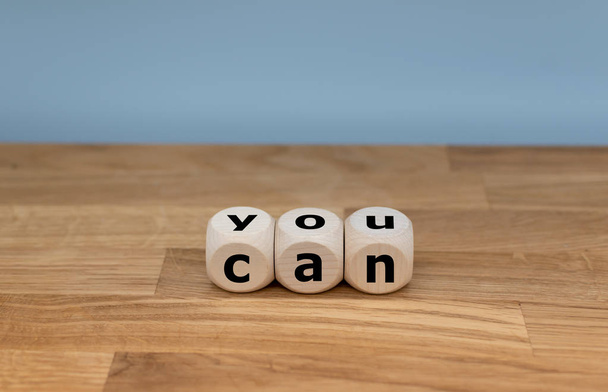 Dice form the expression "you can". - 写真・画像