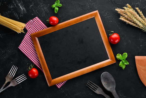 Wooden board for notes with vegetables. Menu. On the old background. Top view. Free copy space. - 写真・画像
