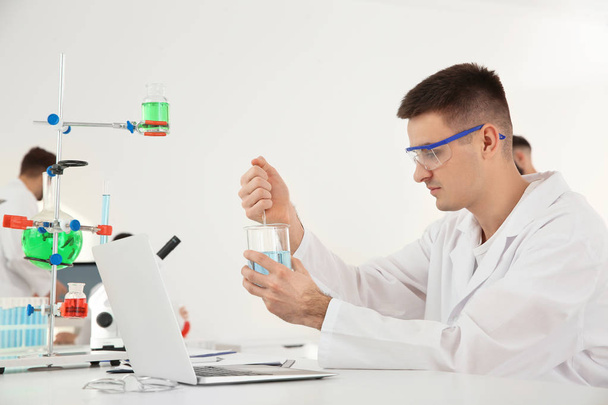 Medical student working in modern scientific laboratory - Фото, зображення