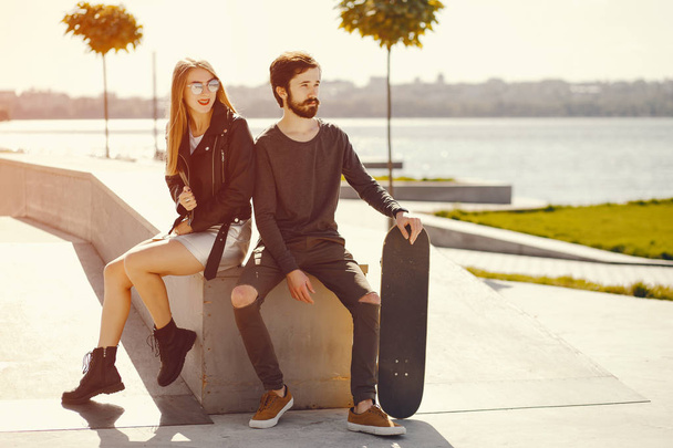 couple with skate - Foto, Imagen