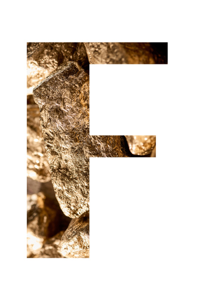 letter F made of shiny golden stones isolated on white - Foto, Imagen