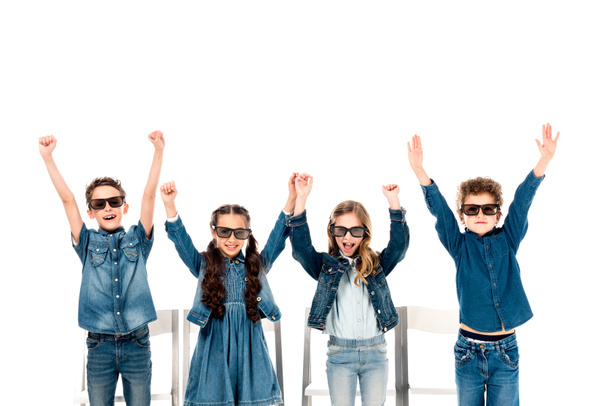 four happy kids in 3d glasses waving hands isolated on white - Fotó, kép