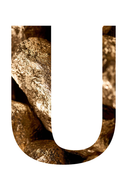 kirjain U valmistettu kiiltävä kultaiset kivet eristetty valkoinen
 - Valokuva, kuva