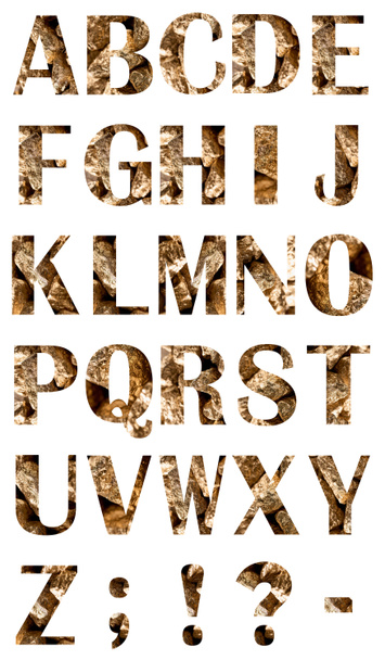 alfabet i symbole wykonane z błyszczących złotych kamieni na białym tle - Zdjęcie, obraz