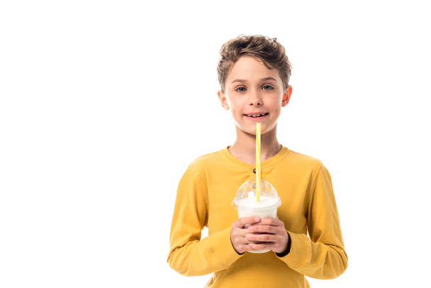 front view of happy kid holding milkshake isolated on white - Photo, Image