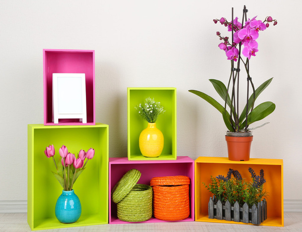 Beautiful colorful shelves with different home related objects - Photo, Image