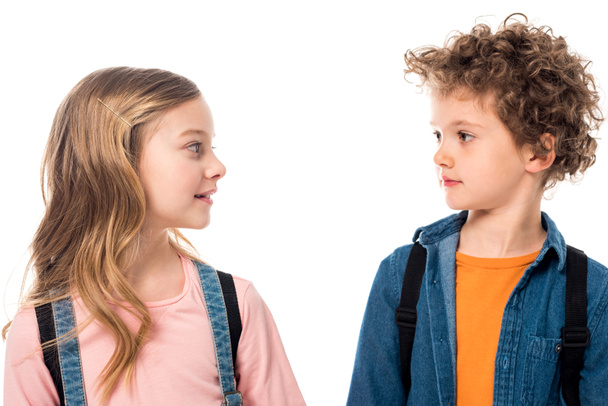 two kids looking at each other isolated on white - Foto, immagini