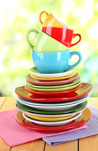 Mountain colorful dishes on napkin on nature background - Φωτογραφία, εικόνα