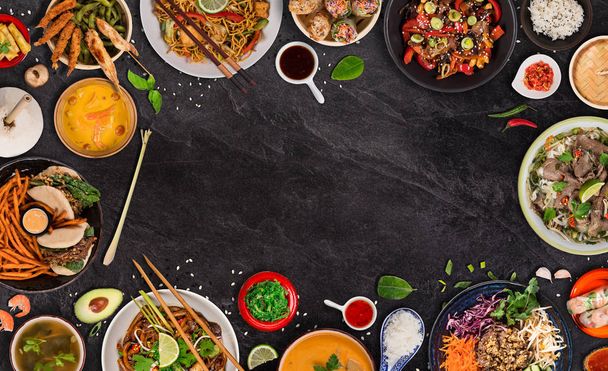 Asian food background with various ingredients on rustic stone background , top view. - Foto, Imagen