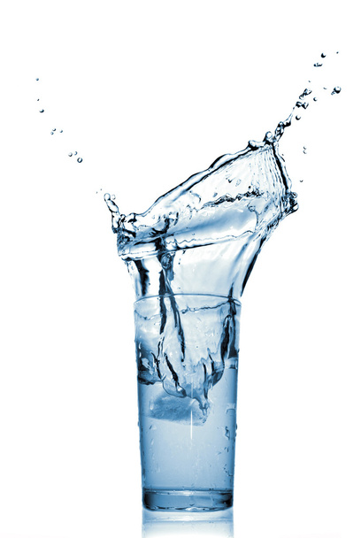 Water splash in glass isolated on white - Φωτογραφία, εικόνα