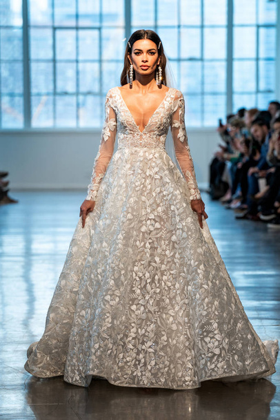 NEW YORK, NY - APRIL 12: A model walks the runway  during the Berta Bridal Spring 2020 fashion collection at New York Fashion Week: Bridal on April 12, 2019 in NYC. - 写真・画像