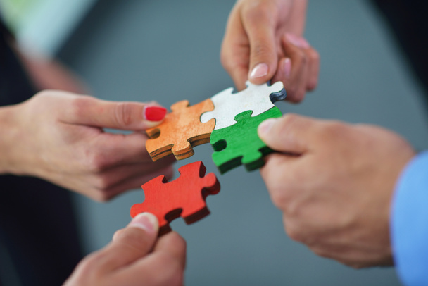 Group of business assembling jigsaw puzzle - Photo, Image