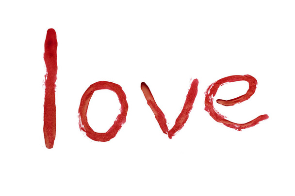 Sana rakkaus kirjoitettu punaisella maalilla valkoisella taustalla
 - Valokuva, kuva