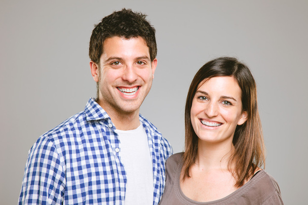Portrait of a beautiful young happy smiling couple - Foto, Imagem