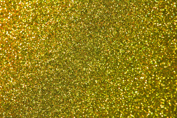 Közelről sárga arany Glitter a bokeh a háttérben - Fotó, kép