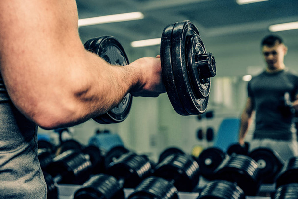 Bodybuilder in the gym - Photo, Image