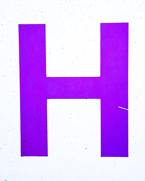Kirjoitettu sanamuoto ahdistuneessa tilassa Typografia Löytyi kirje H
 - Valokuva, kuva