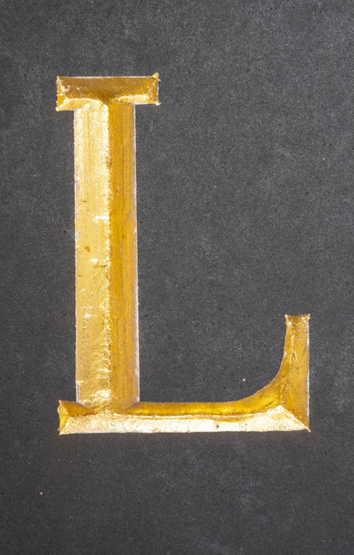 Schriftelijke formulering in noodtoestand Typografie gevonden brief L - Foto, afbeelding