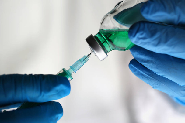 Scientist Holding Green Drug Vaccine Syringe - Foto, Imagem