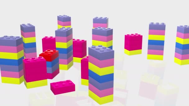 Wieże kolorowych cegieł zabawkowych - Materiał filmowy, wideo