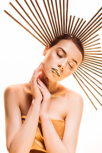 young beautiful woman with closed eyes, golden makeup and accessory on head isolated on white - Photo, image