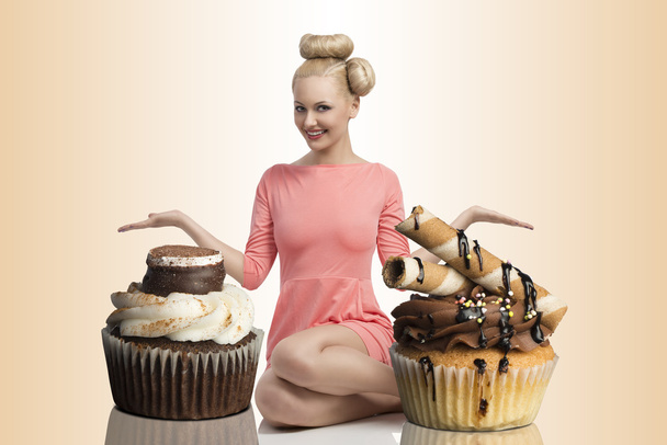 happy girl with two big cupcakes - Photo, image