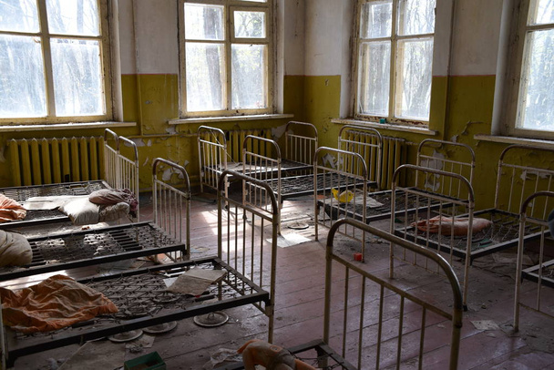 interior of abandoned hospital in radioactive zone of nuclear disaster in Chernobyl, Ukraine - Фото, изображение