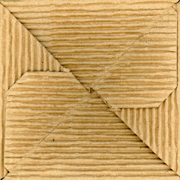 коричневый гофрированный картонный фон - Фото, изображение