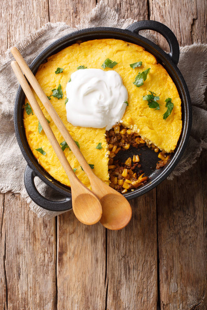 Perfect Tamale Pie Recipe - Rich zesty beef filling topped with  - Photo, Image