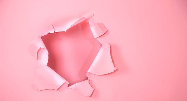 The background is pink with a hole for advertisement - Photo, Image
