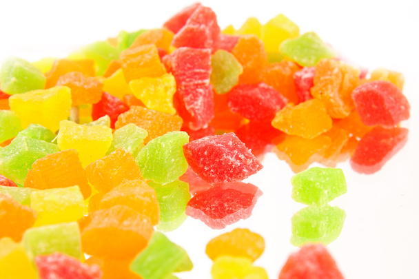 Fruit candy multi-colored on the reflective surface - Zdjęcie, obraz