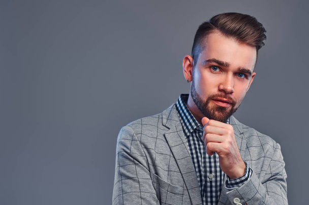 Portrait of attractive pensive man in checkered shirt and  gray blaser - Fotografie, Obrázek