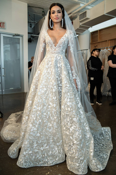 NEW YORK, NY - APRIL 12: A model posing backstage before the Berta Bridal Spring 2020 fashion show at New York Fashion Week: Bridal on April 12, 2019 in NYC. - 写真・画像