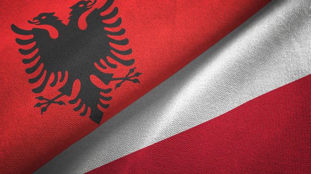 Albania ja Puola kaksi lippua tekstiilikangas, kangas rakenne
 - Valokuva, kuva