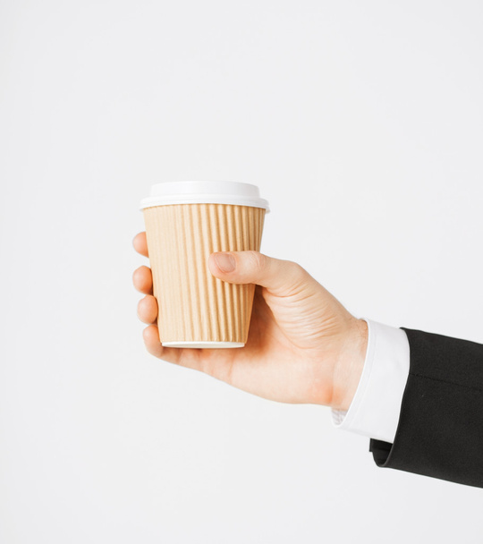 Man hand holding take away coffee - Foto, Imagen