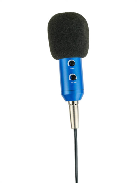 Vertically positioned blue microphone with wire isolated on white background. - Photo, Image