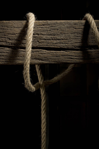 Rope on a wooden crossbeam - Zdjęcie, obraz