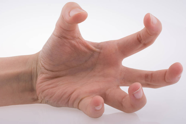 Ανθρώπινο χέρι gesturing σε λευκό φόντο - Φωτογραφία, εικόνα