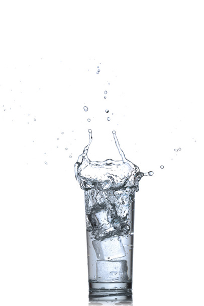 Water splashes in the glass isolated on white - Photo, Image